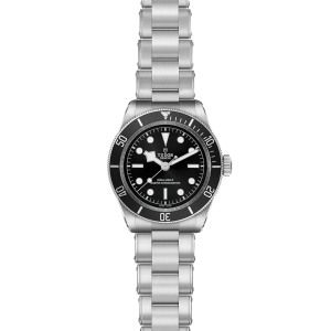 Tudor stainless steel dive watch with black face, luminous markers, and unidirectional bezel.