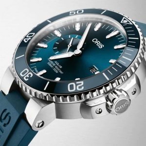 Oris Aquis diving watch features a blue gradient dial and robust stainless steel construction.