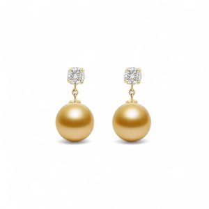 Elegant golden pearl earrings with sparkling gems, perfect for any occasion.