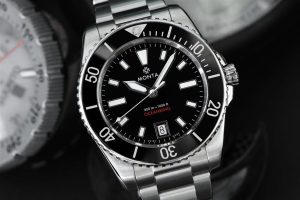 Stylish Monta dive watch with stainless steel case, black dial, and 300-meter water resistance.