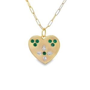 Elegant gold heart-shaped pendant adorned with emeralds and diamonds, perfect for gifts or special occasions.