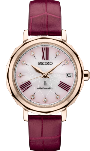 Elegant Seiko wristwatch with rose gold case, mother-of-pearl dial, and burgundy leather strap.
