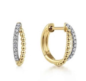 Elegant gold hoop earrings with sparkling stones, perfect for any occasion or outfit.