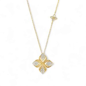 Elegant gold necklace with floral pendant and sparkling stones, perfect for any occasion.