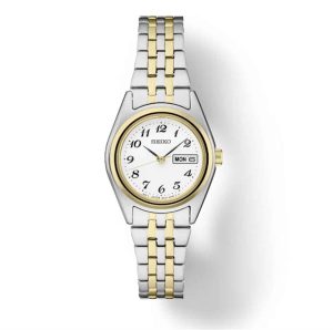 Stylish Seiko watch featuring gold-tone bezel, two-tone bracelet, and a date display.
