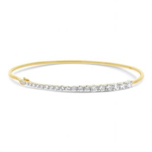 Elegant yellow gold bangle bracelet adorned with sparkling white gemstones for timeless luxury.