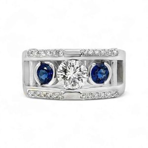 Elegant white gold ring featuring a brilliant diamond and blue sapphire gemstones for a stunning look.