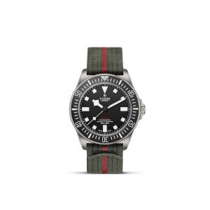 Tudor dive watch with stainless steel case, black dial, and stylish olive green nylon strap.