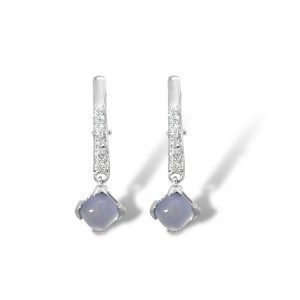 Elegant silver earrings with light blue gemstones and sparkling accents for versatile styling.