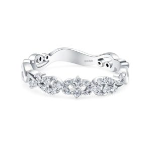 Elegant white metal ring with intricate diamond motif, perfect for special occasions.