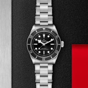 Elegant stainless steel watch with black bezel and minimalist dial design.