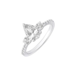 Elegant three-stone engagement ring featuring a pear-shaped diamond in white gold.