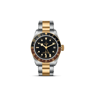 Tudor watch with stainless steel and gold accents, black dial, and rotating burgundy bezel.