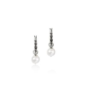 Elegant silver hoop earrings with classic white pearls for versatile, timeless style.