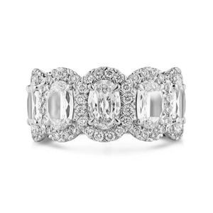 Elegant white metal ring with oval stones and diamonds, perfect for luxury occasions.