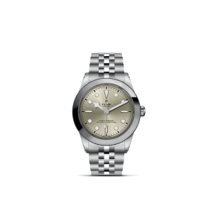 Elegant Tudor stainless steel wristwatch featuring a brushed silver dial and chronometer certification.