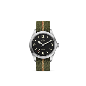 Tudor Ranger watch featuring a stainless steel case, black dial, and olive green strap.