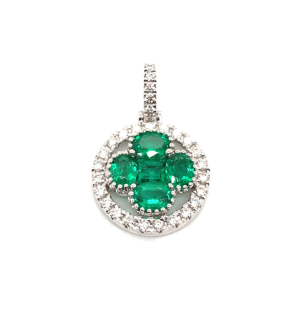 Elegant emerald and diamond pendant, featuring a striking cross design in polished white metal.
