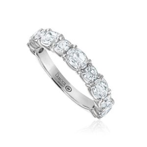 Elegant white gold band ring with sparkling oval and round cut stones for timeless beauty.