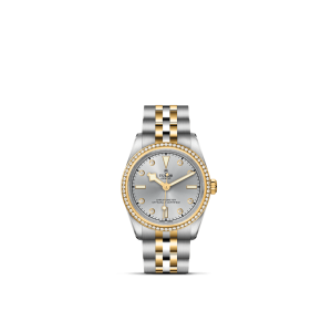 Tudor luxury watch featuring a diamond bezel and two-tone gold and stainless steel bracelet.