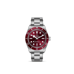 Tudor diving watch features vibrant red dial, stainless steel case, and durable bracelet.