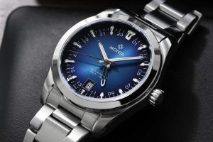 Sophisticated MONTA wristwatch with deep blue dial and stainless steel bracelet, showcasing elegance and functionality.