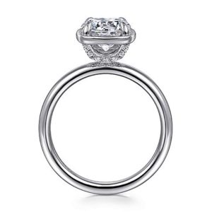 Elegant diamond engagement ring with a princess-cut stone and shimmering accent diamonds.