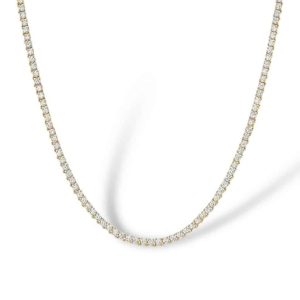 Elegant gold necklace with sparkling stones, perfect for any occasion.