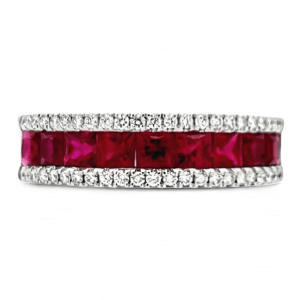 Stunning red ruby and diamond ring in white metal, perfect for luxury and elegance.