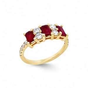 Elegant ruby and diamond ring in yellow gold, showcasing stunning craftsmanship and timeless beauty.