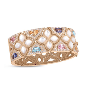 Elegant gold bracelet with colorful gemstones and pearls, showcasing intricate floral designs.