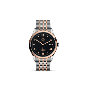 Elegant Tudor watch with stainless steel and rose gold accents, featuring a black dial and Roman numerals.