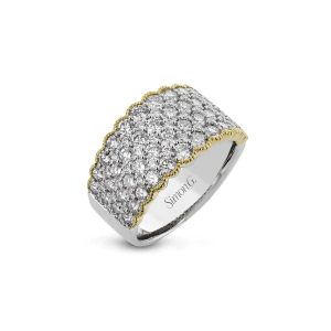 Elegant silver and gold ring with sparkling stones, perfect for special occasions or gifting.