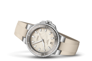 Elegant Oris watch with a mother-of-pearl dial and rubber strap, perfect for any occasion.