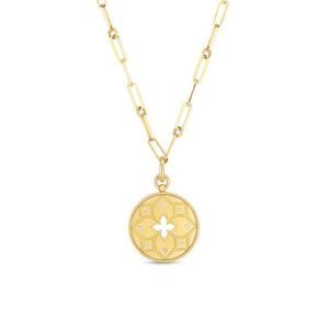 Elegant gold pendant necklace with floral design and sparkling diamonds for a timeless look.