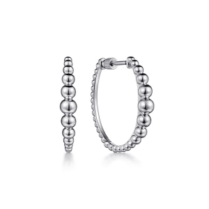 Elegant silver hoop earrings with textured bead design, perfect for any occasion.