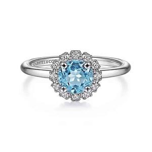 Elegant blue cushion-cut ring with diamond halo in white metal by Gabriel & Co.