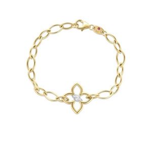 Elegant gold bracelet featuring a floral design, silver accents, and sparkling stones.