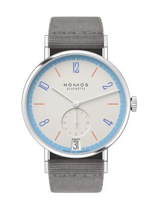 Elegant NOMOS Glashütte watch with minimalist design, pale cream face, and gray fabric strap.
