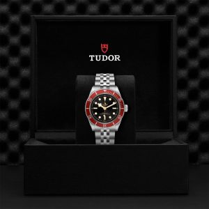Tudor watch in luxurious presentation box, showcasing elegant design and craftsmanship.