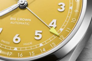 Vibrant yellow dial watch with big crown automatic features and Swiss craftsmanship for stylish timekeeping.