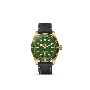 Tudor watch with green dial, gold bezel, and black leather strap, perfect for elegance and functionality.