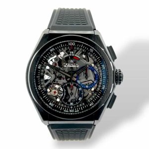 Zenith El Primero chronograph watch with black skeleton dial and sporty elegance.