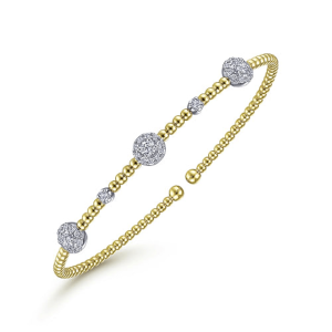 Elegant yellow gold bracelet with diamonds, showcasing classic and contemporary jewelry design.