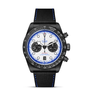 Sleek Tudor chronograph watch with matte black case, white dial, and vibrant blue accents.