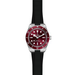 Tudor diving watch with burgundy bezel and robust design for style and functionality.