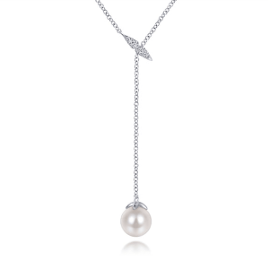 Elegant pearl necklace with silver chain and leaf accents, perfect for any occasion.