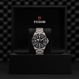 Tudor luxury watch in elegant box, featuring a sleek design and durable steel bracelet.