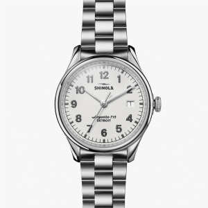 Elegant Shinola wristwatch with stainless steel case, white dial, and versatile design for any occasion.