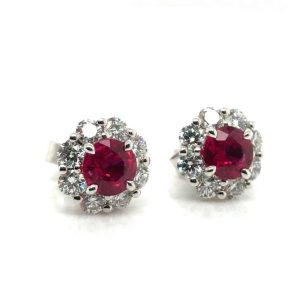 Elegant ruby and diamond earrings in white gold, embodying timeless sophistication and luxury.